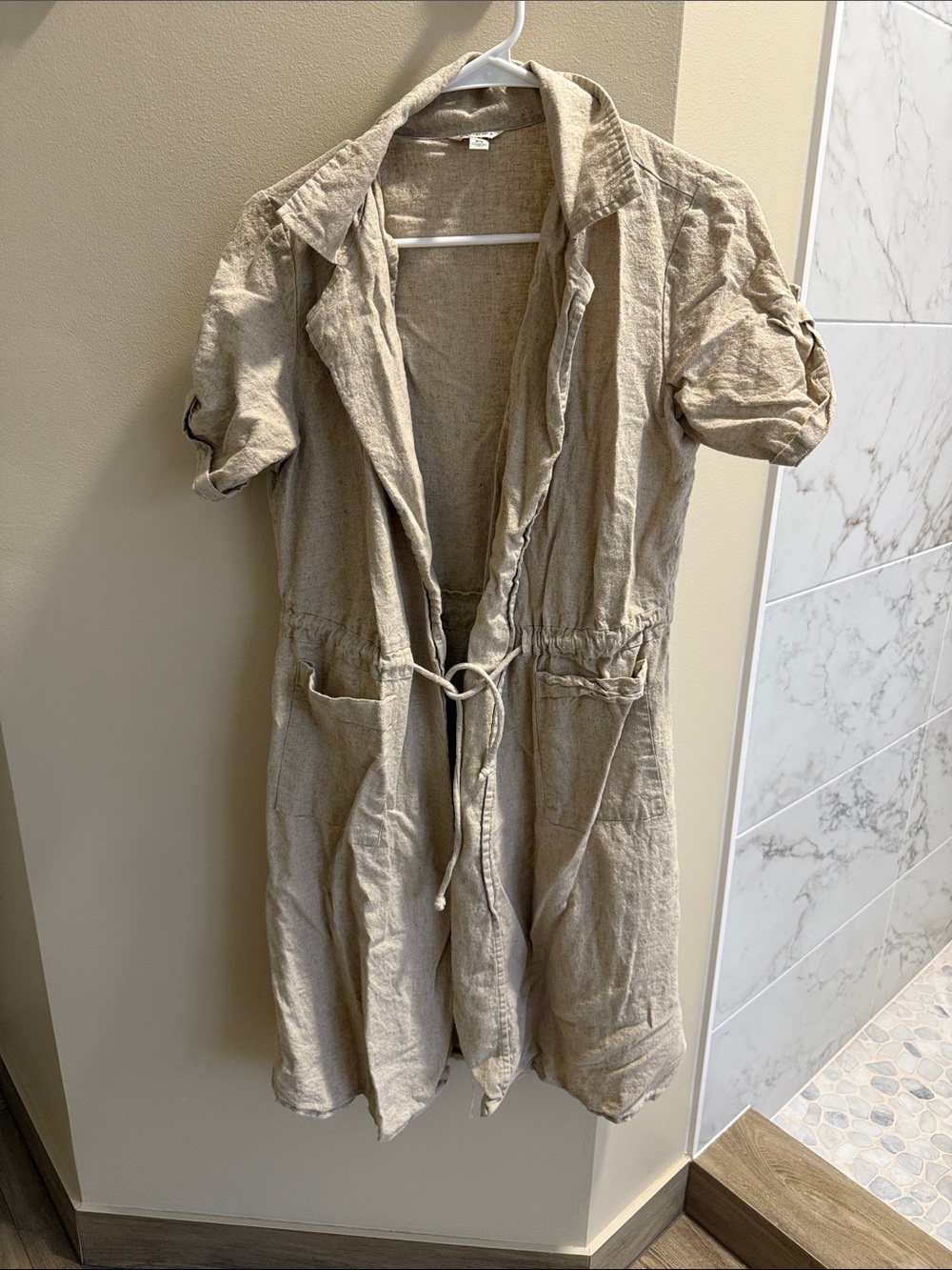 Size XS sand colored short sleeve cardigan